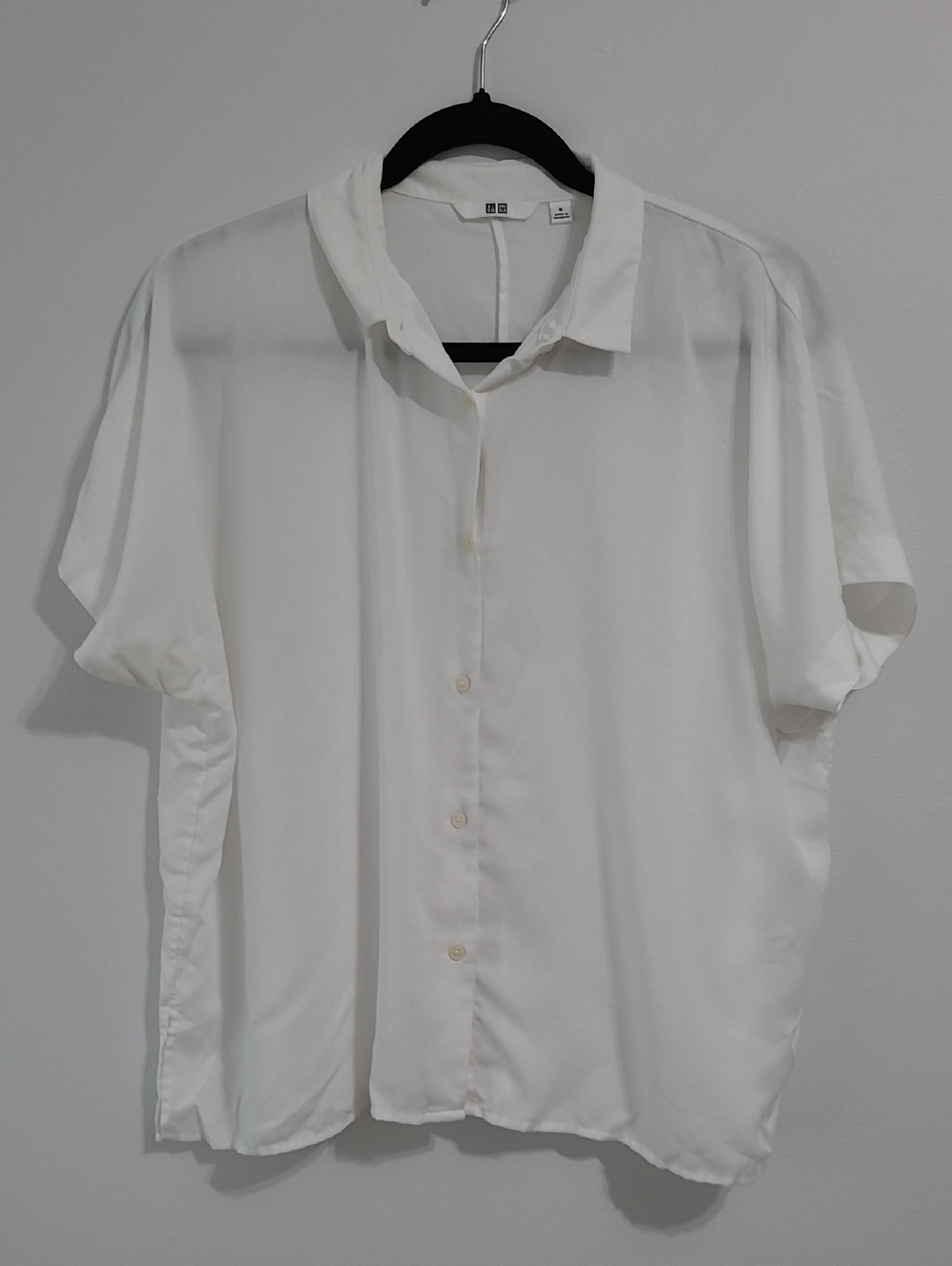 44. Uniqlo 76% rayon blouse